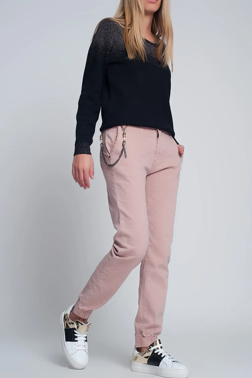 Cuffed utility pants with chain in pink