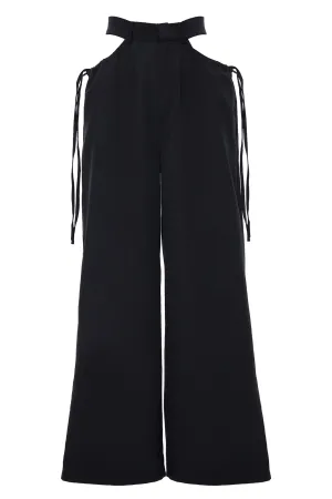 TROUSERS WITH OPENINGS